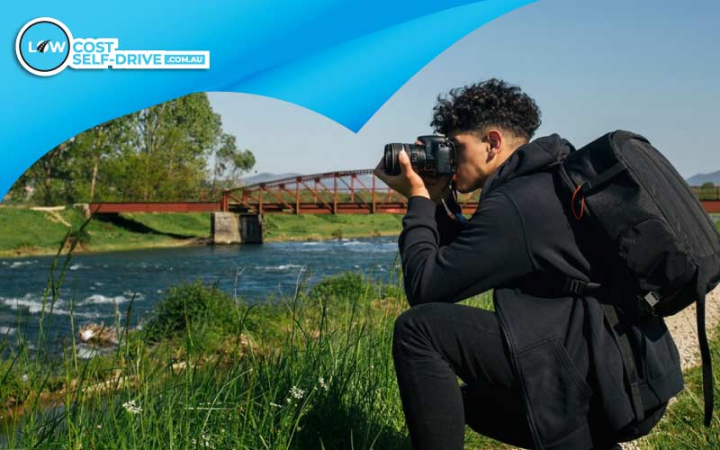 thumbnail man taking photos of a flock of birds, birdwatching trip, Self-Drive Adventure with Low-Cost Self-Drive
