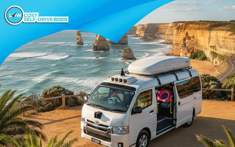 A modern self-drive minibus parked overlooking the Twelve Apostles on the Great Ocean Road, ready for a group summer holiday